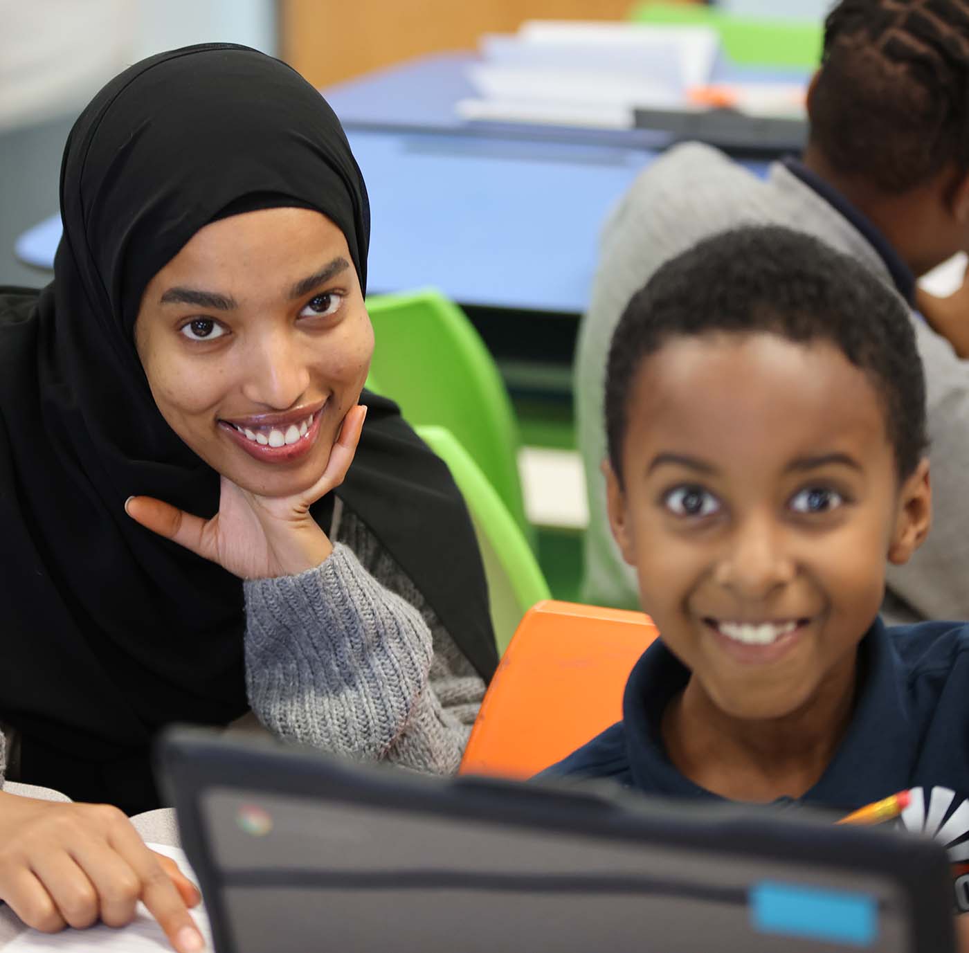 Horizon Science Academy Columbus Elementary student drawing at a desk in a classroom setting